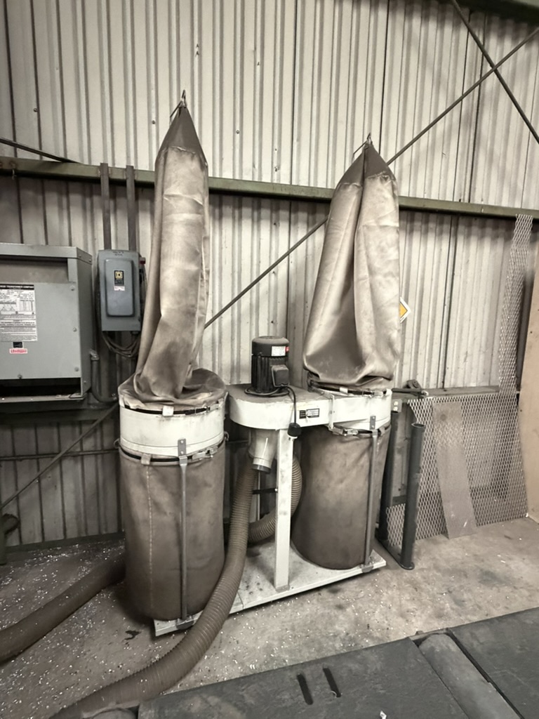 Dual-bag aluminum chip collector included with the PMI-2036 saw system