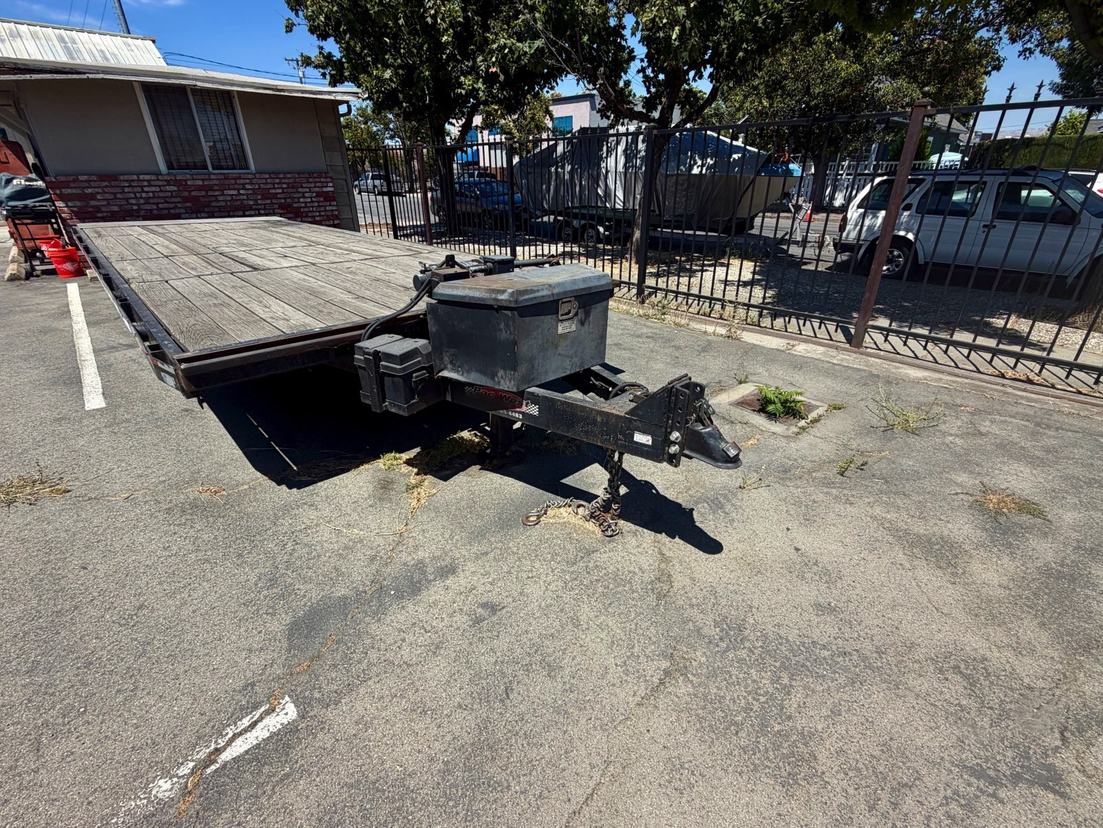 Overview of PacWest 24-foot hydraulic tilt-bed equipment trailer