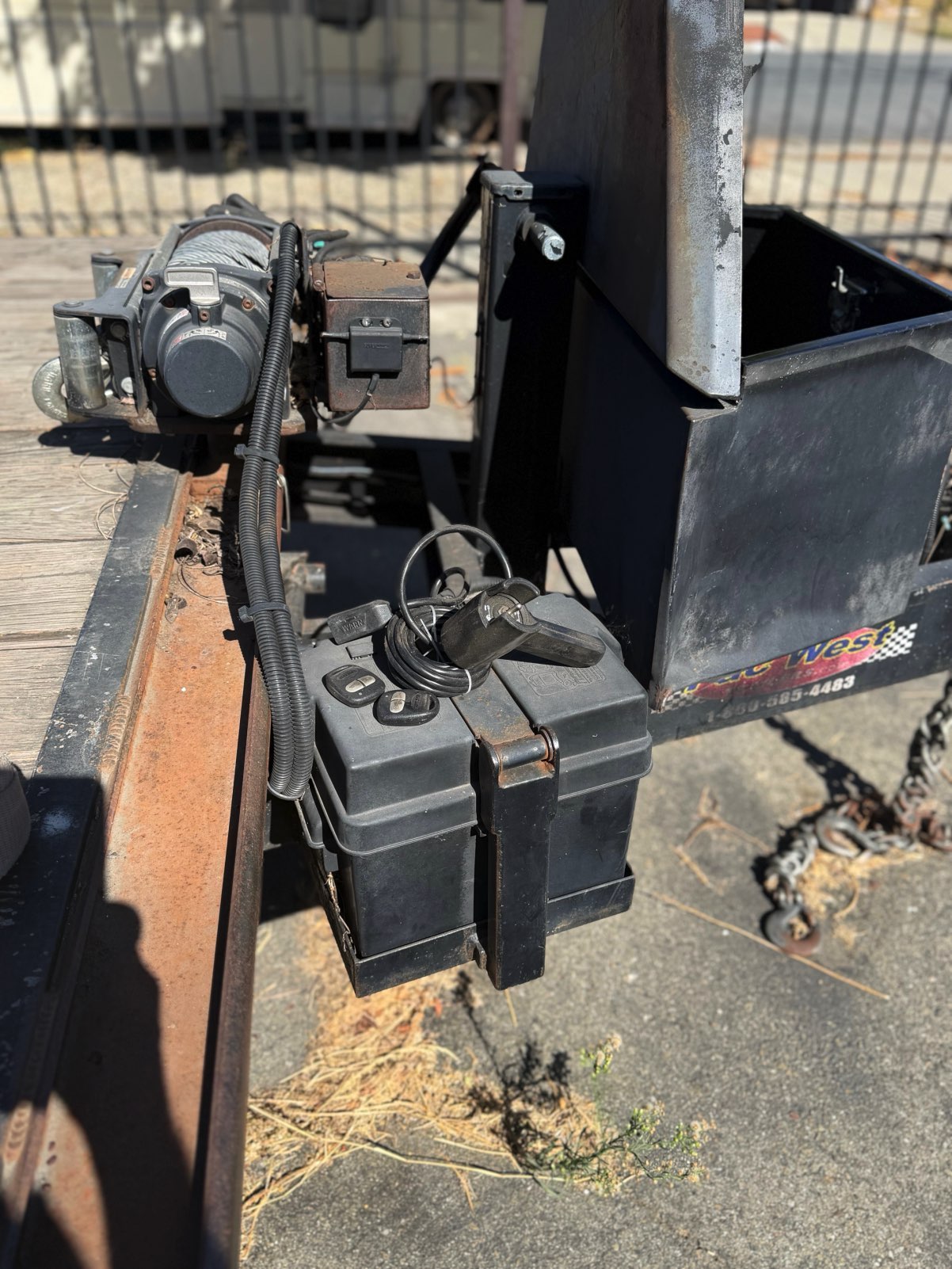 Battery box with wired hydraulic tilt controls and key fobs