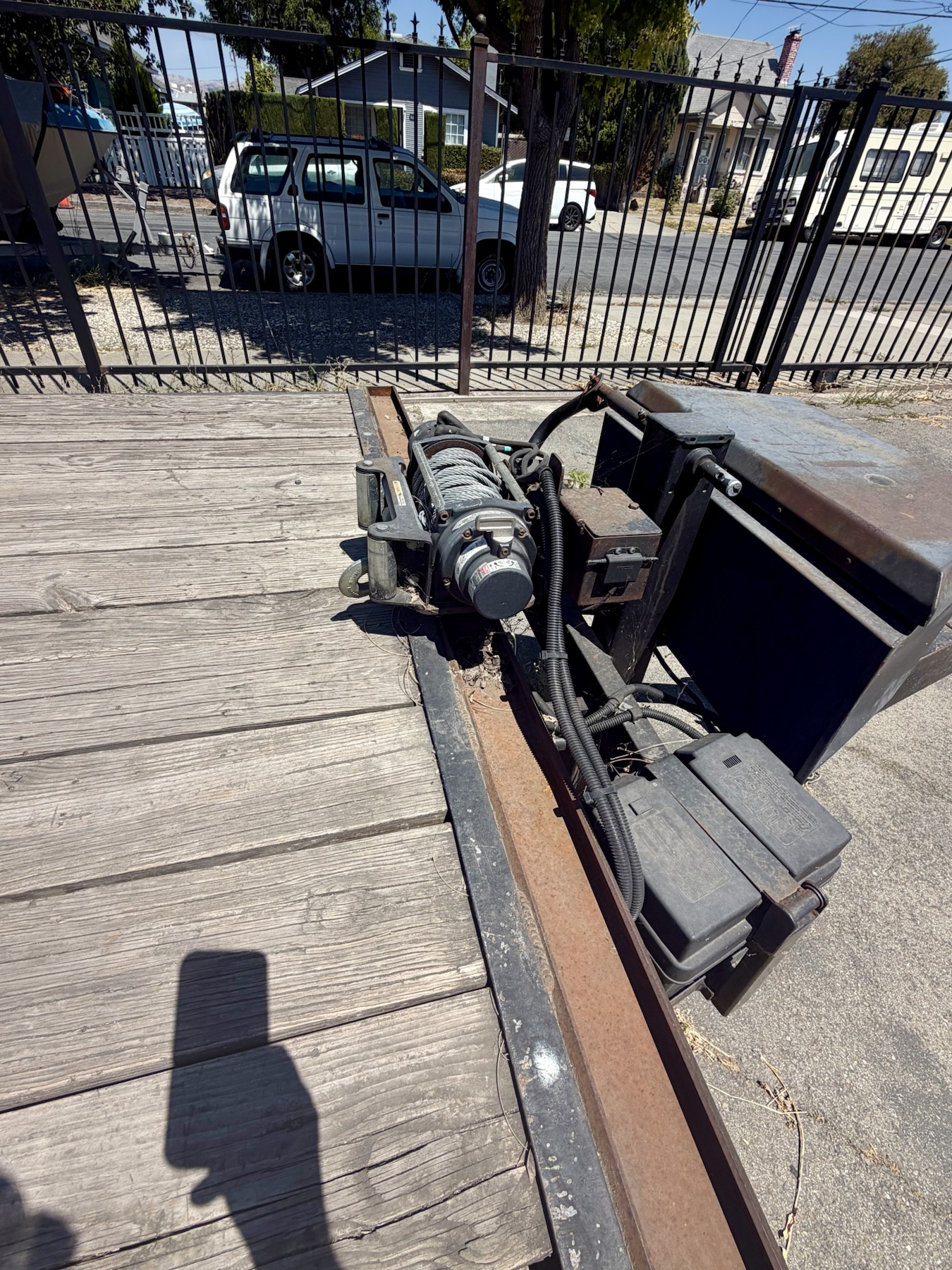 Powered winch installed at the front of the trailer deck