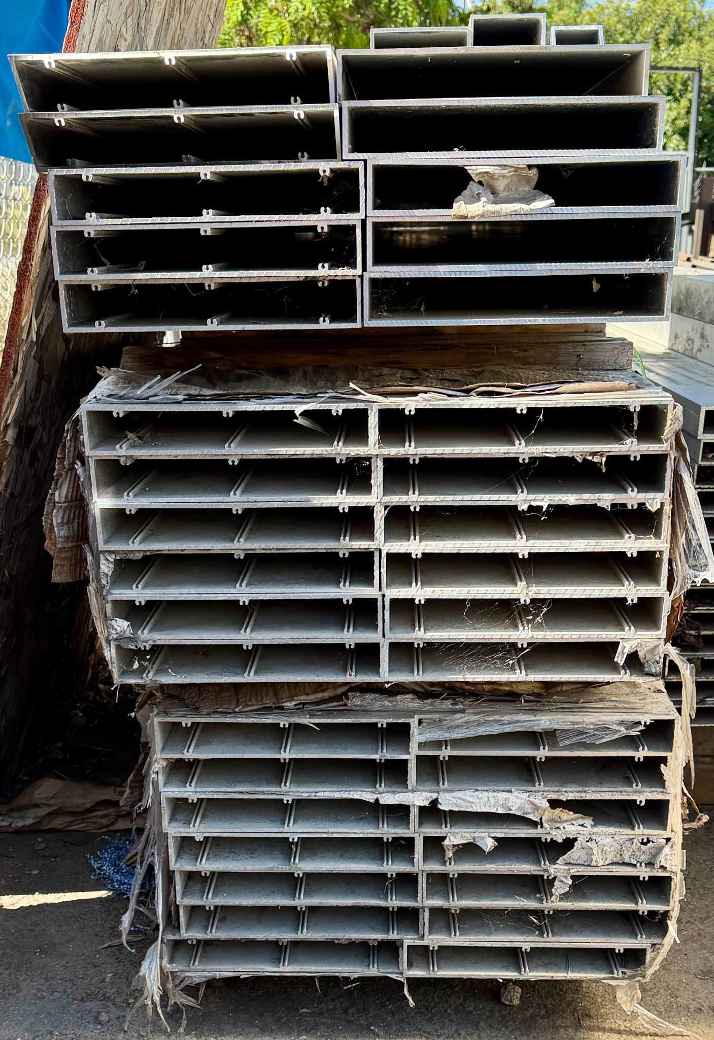 Stacked 2-by-12-inch aluminum rectangular-tube inventory