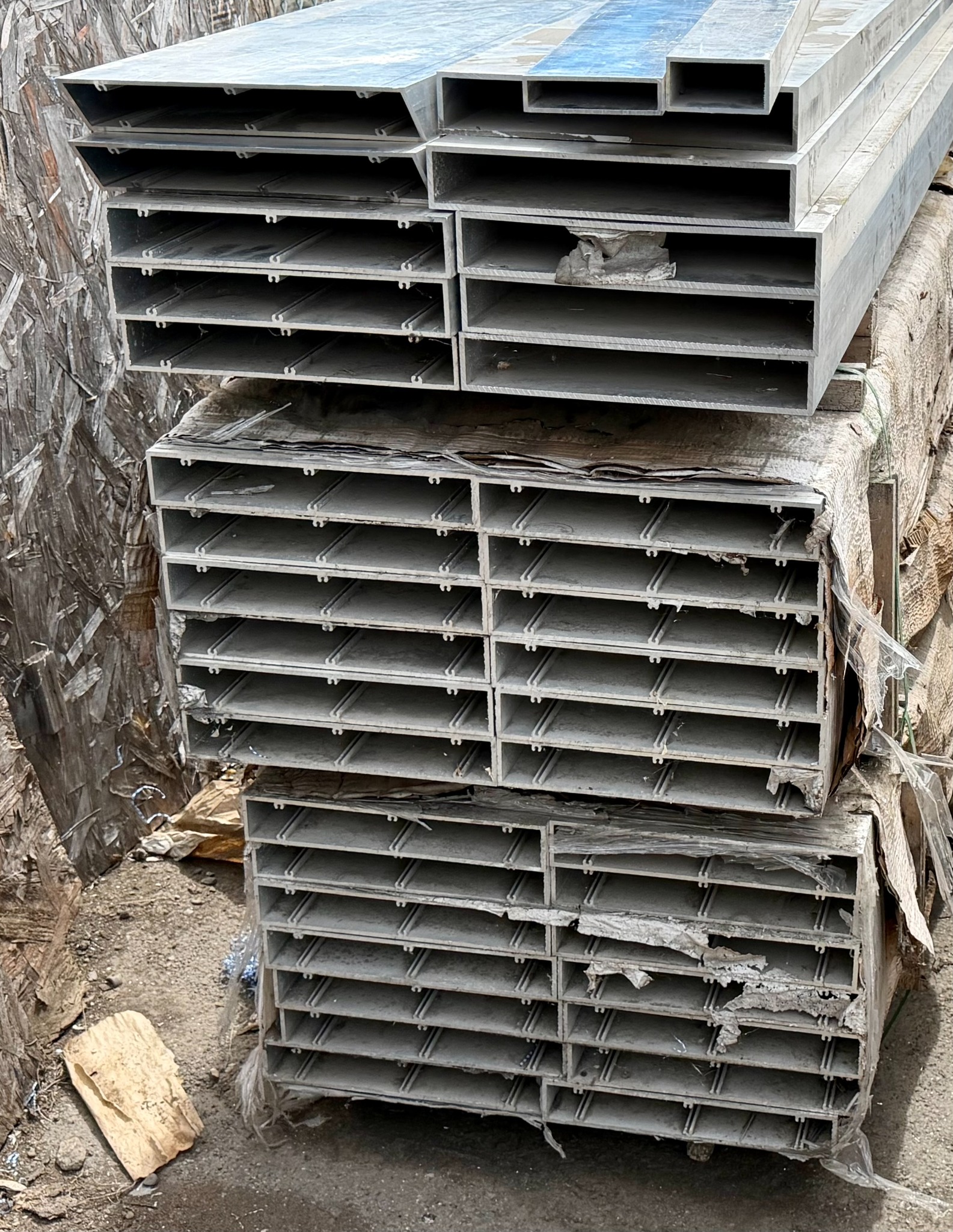 Additional stacks of 2-by-12-inch aluminum rectangular-tube extrusions